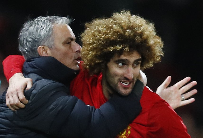 manchester united 039 s marouane fellaini celebrates scoring their second goal with manager jose mourinho photo reuters