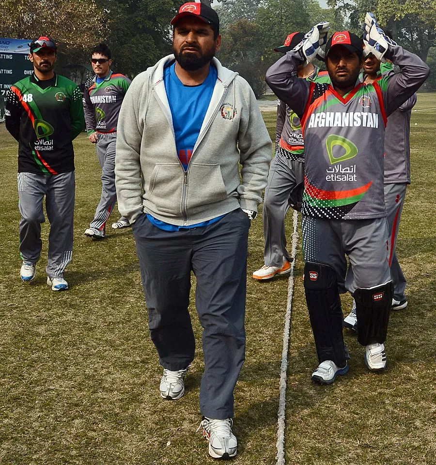 kabir khan c while coaching afghanistan players in lahore on january 31 2013 photo afp kabir khan c while coaching afghanistan players in lahore on january 31 2013 photo afp