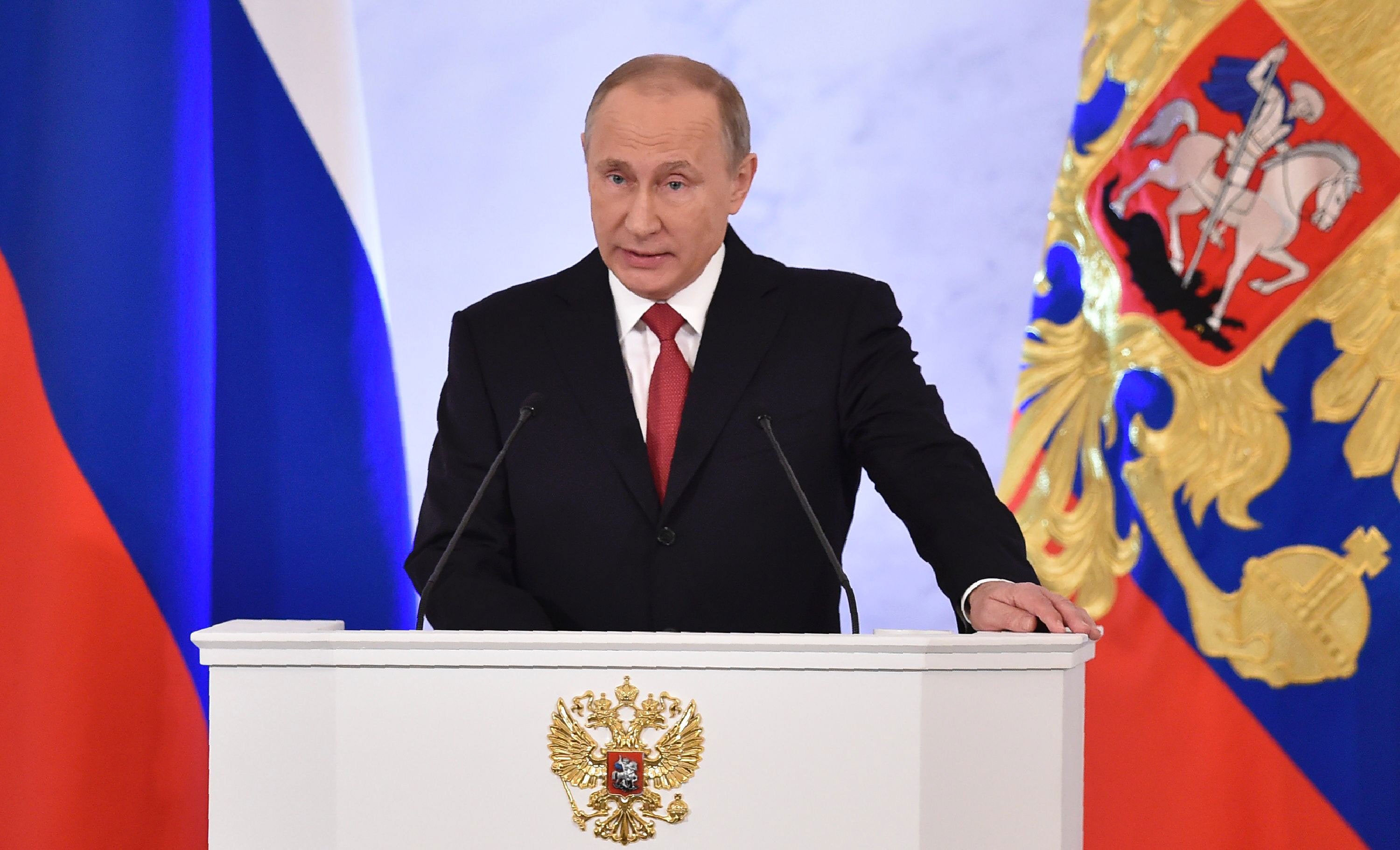 russian president vladimir putin addresses the federal assembly of both houses of parliament at the kremlin in moscow on december 1 2016 photo afp