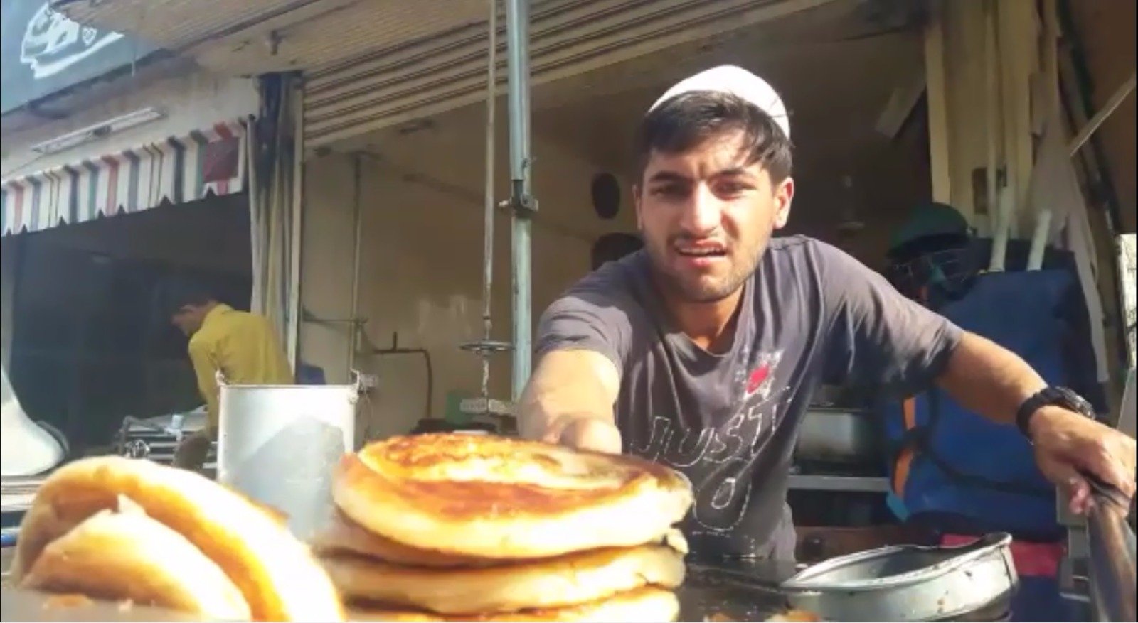 the 19 year old hanan whose long term goal is to don pakistani colours at international level supports his career by making parathas at a roadside diner photo courtesy hanan khan