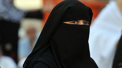 unfair burqa poster criticised ahead of swiss naturalisation debate