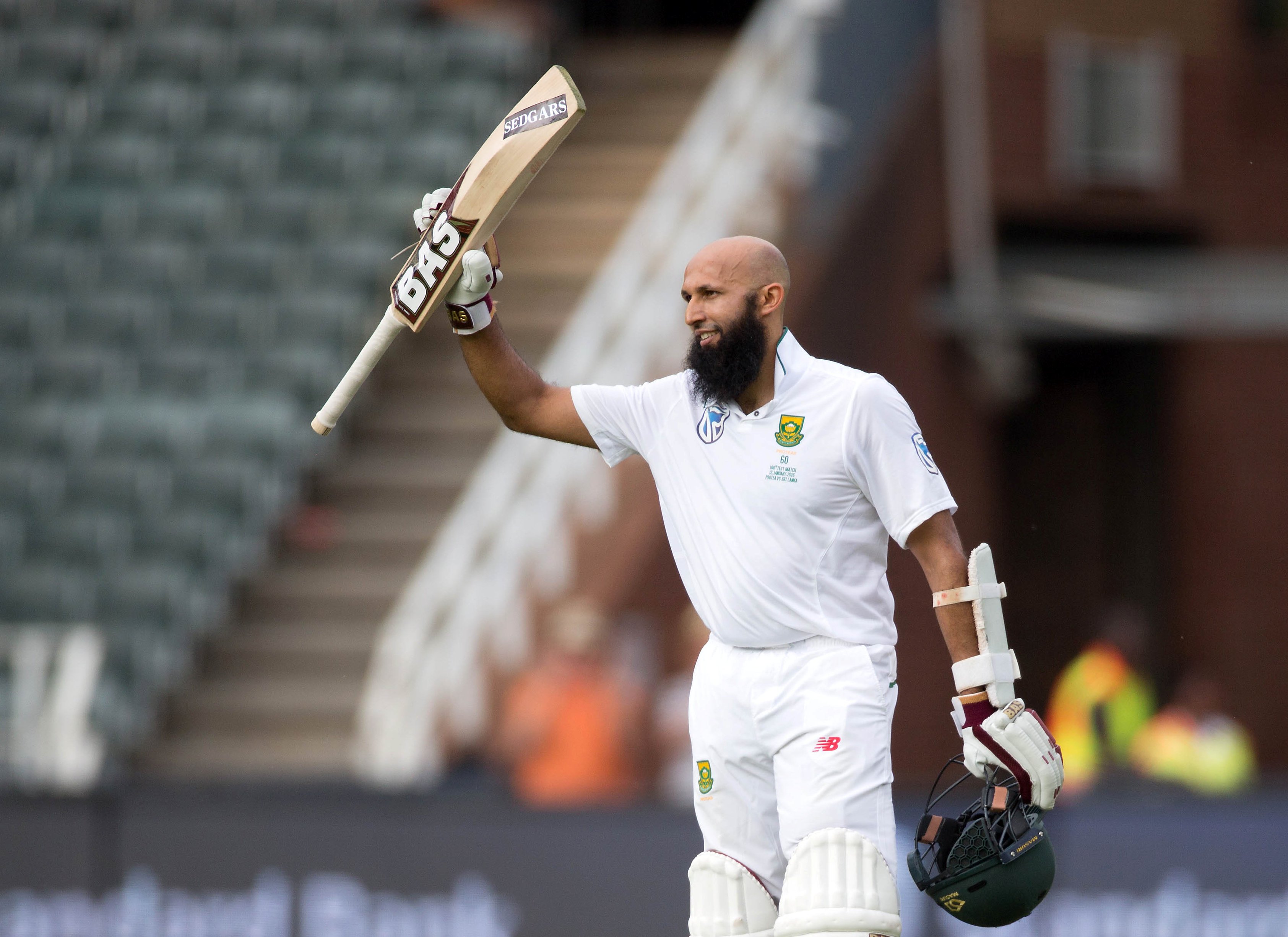 south africa 039 s hashim amla celebrates scoring a century in his 100th test against sri lanka on january 12 2016 photo reuters