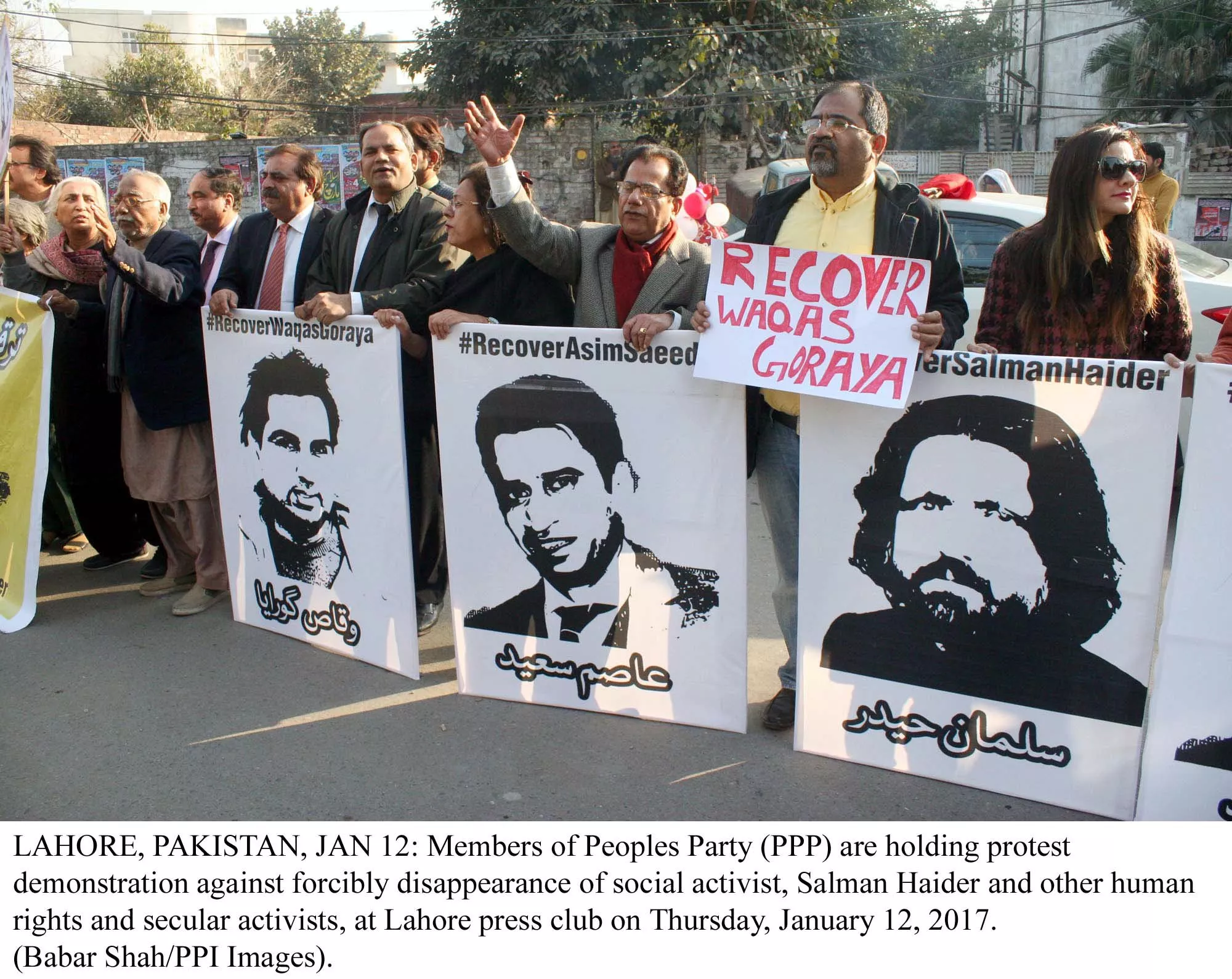 members of ppp are holding protest demonstration against forcibly disappearance of social activist salman haider and other human rights activists at lahore press club photo ppi members of ppp are holding protest demonstration against forcibly disappearance of social activist salman haider and other human rights activists at lahore press club photo ppi
