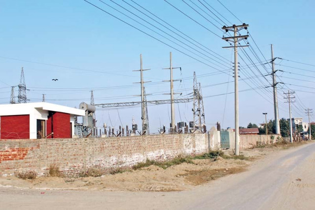 despite court orders lesco has continued the construction of the grid inside the housing scheme photo express despite court orders lesco has continued the construction of the grid inside the housing scheme photo express