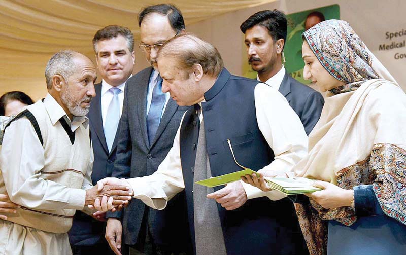 pm nawaz distributes pakistan sehat cards in narowal photo app