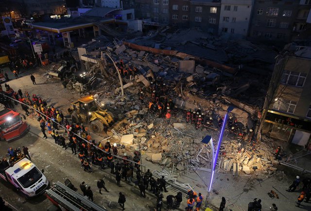 firemen and rescue workers stand on the wreckage of a building that collapsed and caused several casualities according to local media in istanbul turkey january 13 2017 photo reuters