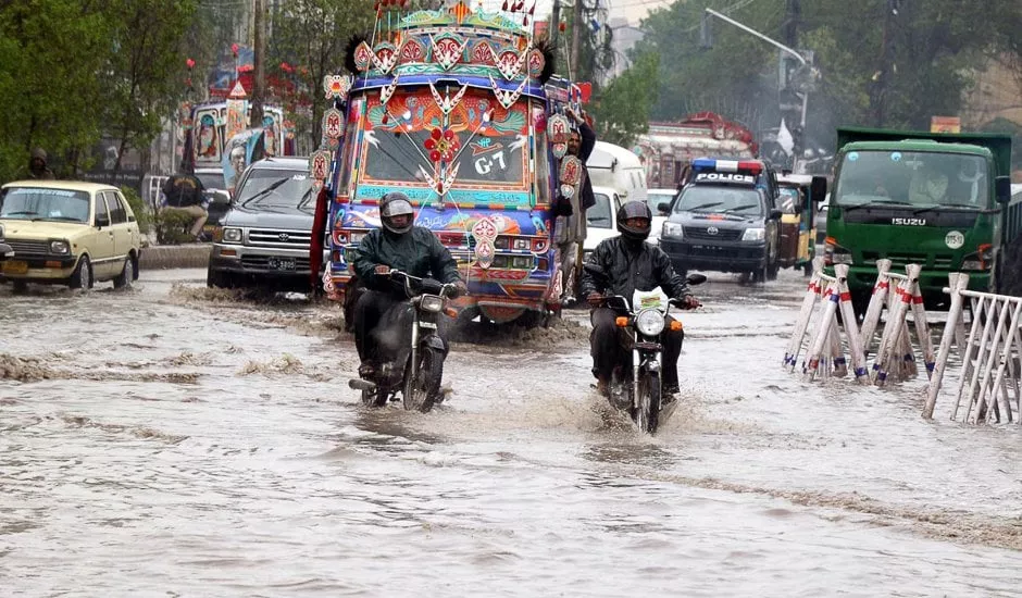 rain water is seem accumulated on a road near tower photo online rain water is seem accumulated on a road near tower photo online