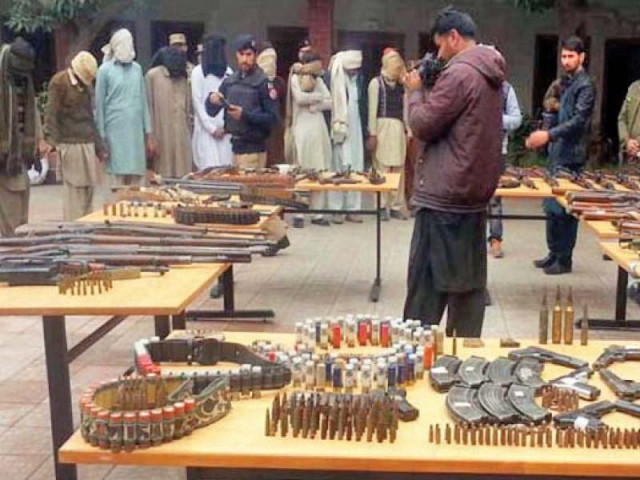 police present the arrested suspects and the recovered weapons photo inp police present the arrested suspects and the recovered weapons photo inp