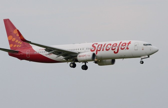 an aircraft of indian airline spicejet making a final approach for landing at indira gandhi international airport in new delhi photo afp
