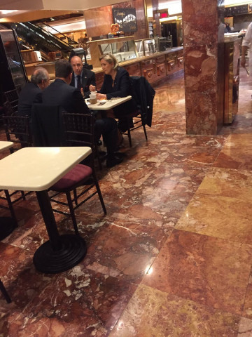 marine le pen with aides at trump tower lobby photo twitter