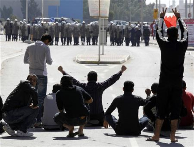 bahrain youths demonstrate in front of the police photo reuters