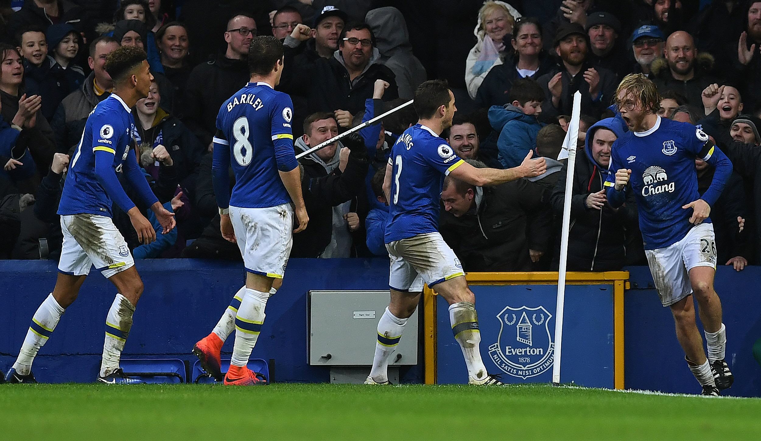 everton 039 s english midfielder tom davies r celebrates with teammates after scoring their third goal during the english premier league football match between everton and manchester city at goodison park in liverpool north west england on january 15 2017 photo afp