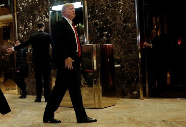 u s president elect donald trump makes an appearance in the lobby at trump tower in new york u s january 13 2017 photo reuters