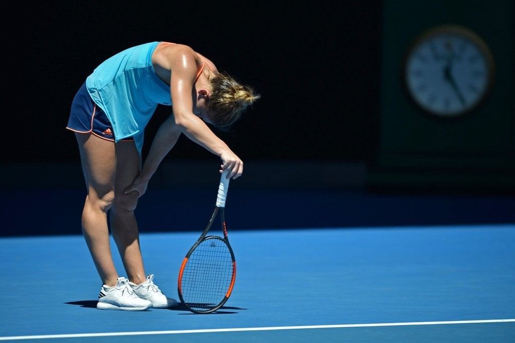 simona halep reacts after a point against shelby rogers in melbourne on january 16 2017 photo afp