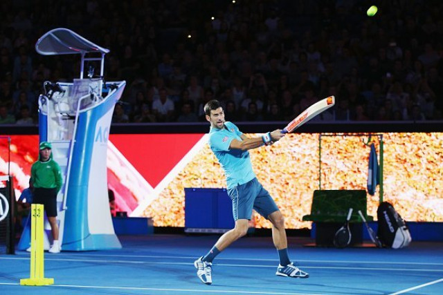 novak djokovic plays few shots off australian great shane warne photo courtesy icc novak djokovic plays few shots off australian great shane warne photo courtesy icc