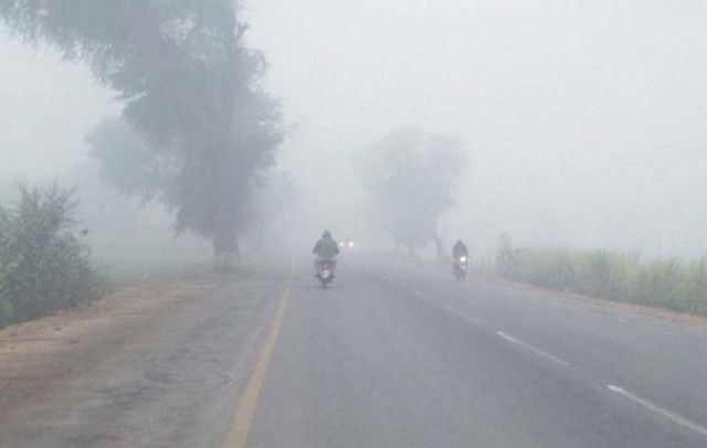 fog engulfs a road leading to rahim yar khan photo online fog engulfs a road leading to rahim yar khan photo online