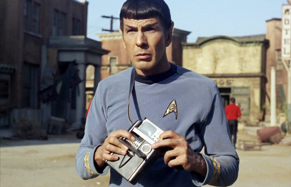 a screenshot from start trek shows spock holding tricorder a molecular sensor