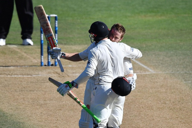 new zealand captain kane williamson r celebrates his ton with henry nicholls during day five of the first test against bangladesh photo afp new zealand captain kane williamson r celebrates his ton with henry nicholls during day five of the first test against bangladesh photo afp