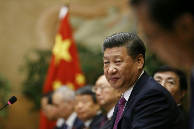 chinese president xi jinping looks on during a meeting at the united nations european headquarters in geneva on january 18 2017 photo afp