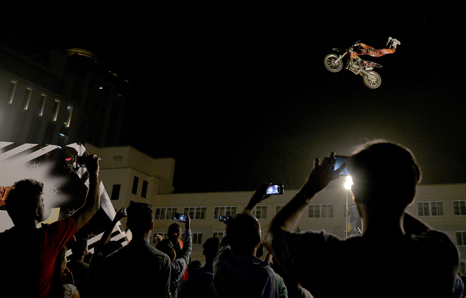 Japanese motorcycle riders perform at the 'Swag Bash' display in the Indian city of Bangalore. PHOTO: AFP