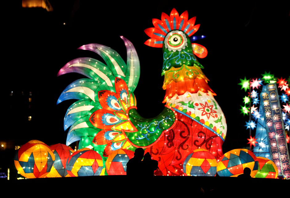 People visit a light show celebrating the Lantern Festival, the last day of Chinese Lunar New Year celebrations, in Beijing. PHOTO: REUTERS