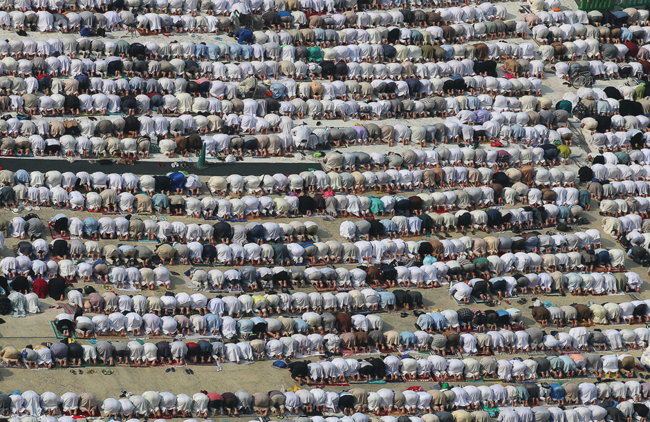 Worshippers bow during prayers in front of the Holy Kaaba prior to the start of the Hajj. PHOTO: AFP