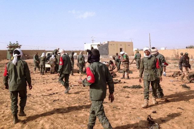 soldiers attend to wounded and casualties following a suicide bomb attack in gao northern mali on january 18 2017 photo afp soldiers attend to wounded and casualties following a suicide bomb attack in gao northern mali on january 18 2017 photo afp
