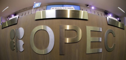opec oil output to come down in january iea
