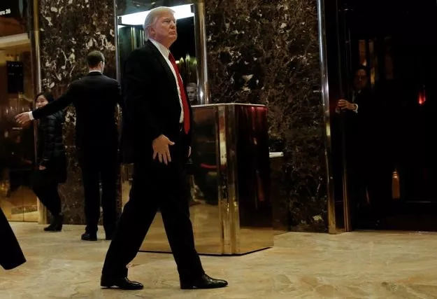 us president elect donald trump makes an appearance in the lobby at trump tower in new york us january 13 2017 photo reuters us president elect donald trump makes an appearance in the lobby at trump tower in new york us january 13 2017 photo reuters