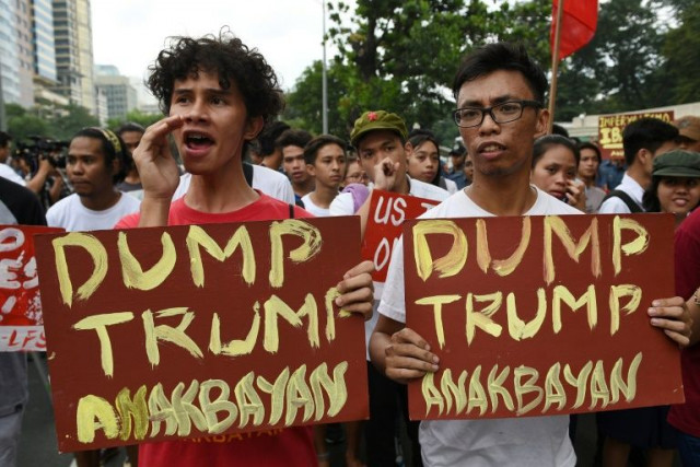 students shout slogans against the us president elect donald trump during a rally in front of the us embassy in manila in november 2016 photo afp students shout slogans against the us president elect donald trump during a rally in front of the us embassy in manila in november 2016 photo afp
