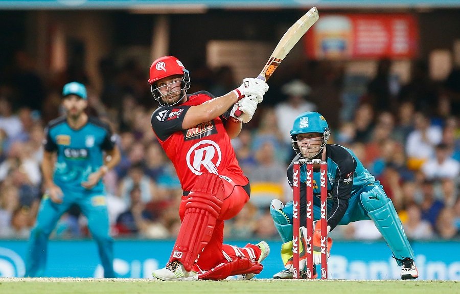 aaron finch of the renegades plays a shot as heat keeper james peirson looks on during the big bash league match at the gabba on january 20 2017 in brisbane australia photo courtesy cricket australia