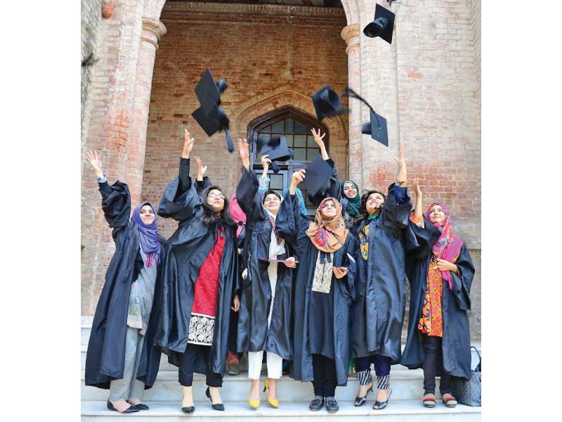 a group of students celebrate their graduation photo express