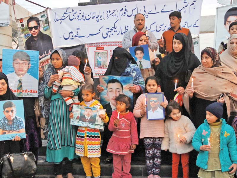 members of the aps shuhada forum hold a protest vigil on the first anniversary of the bku tragedy photo ppi