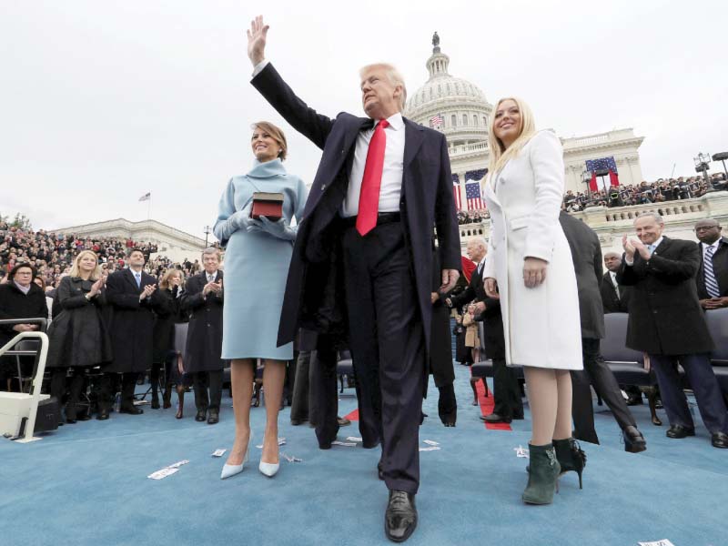 us president donald trump acknowledges the audience after taking oath photo reuters
