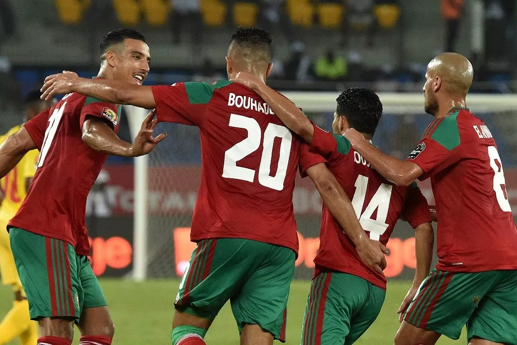 aziz bouhaddouz 2l celebrates with teammates after scoring in oyem on january 20 2017 photo afp aziz bouhaddouz 2l celebrates with teammates after scoring in oyem on january 20 2017 photo afp