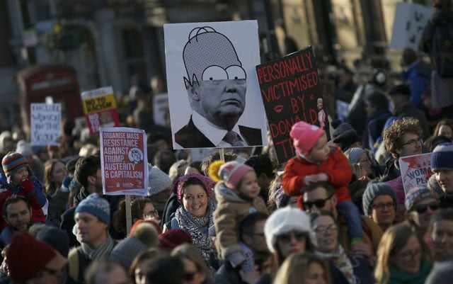 protesters carrying banners take part in the women 039 s march in london on january 21 2017 photo reuters protesters carrying banners take part in the women 039 s march in london on january 21 2017 photo reuters
