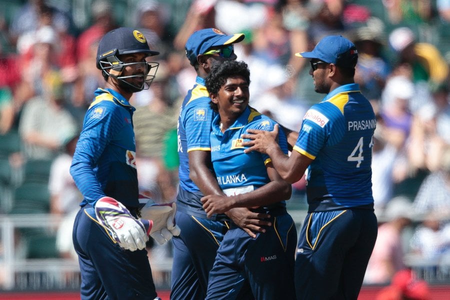 sri lanka bowler lakshan sandakan c celebrates the dismissal of south african batsman mangaliso mosehle not pictured during the second t20 match between south africa and sri lanka on january 22 2017 at wanderers cricket ground in johannesburg photo afp