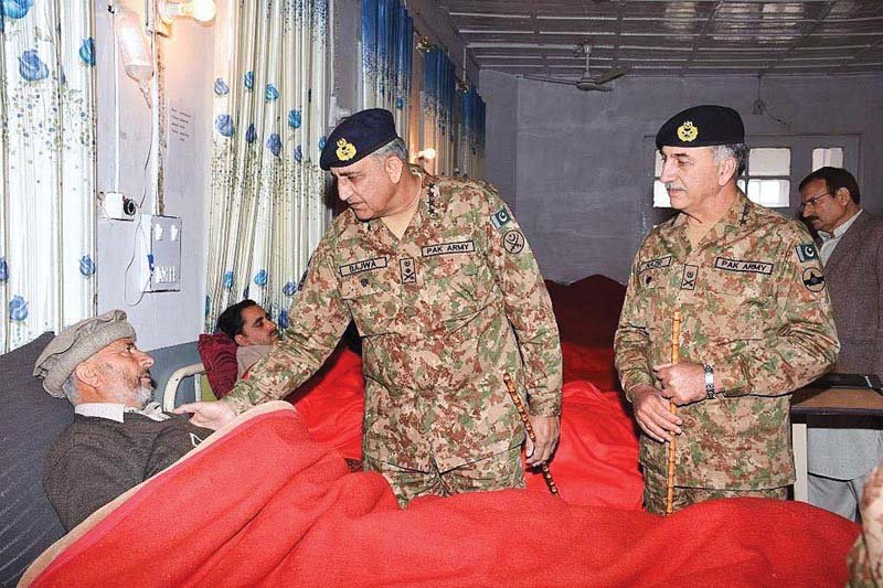 army chief gen qamar bajwa visits an injured at the agency headquarters hospital photo app