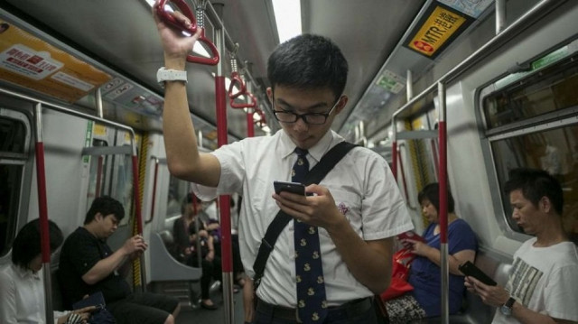 95 1 per cent of the people go online through cellphones photo afp 95 1 per cent of the people go online through cellphones photo afp