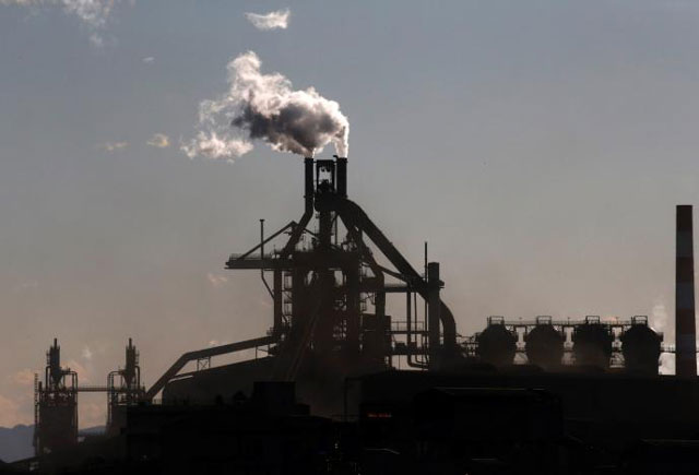 chimneys of a steel factory are pictured at an industrial area in kawasaki japan january 16 2017 picture taken january 16 2017 photo reuters