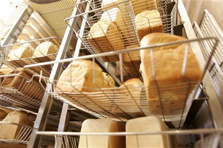 freshly baked bread cools off on the racks at a downtown bakery in taipei july 19 2007 photo reuters
