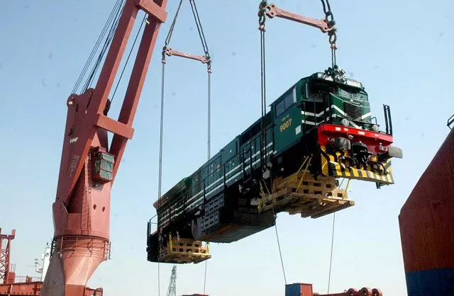 a newly inducted ge locomotive is being offloaded at the karachi port on monday photo app a newly inducted ge locomotive is being offloaded at the karachi port on monday photo app