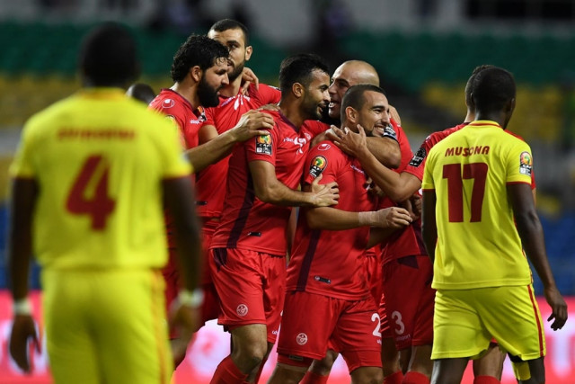 tunisia 039 s midfielder naim sliti r celebrates with teammates in libreville on january 23 2017 photo afp tunisia 039 s midfielder naim sliti r celebrates with teammates in libreville on january 23 2017 photo afp
