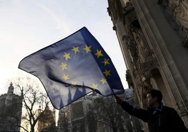 a man waves a european union flag outside the supreme court before the decision of a court ruling on whether theresa may 039 s government requires parliamentary approval to start the process of leaving the european union in parliament square central london britain january 24 2017 photo reuters a man waves a european union flag outside the supreme court before the decision of a court ruling on whether theresa may 039 s government requires parliamentary approval to start the process of leaving the european union in parliament square central london britain january 24 2017 photo reuters