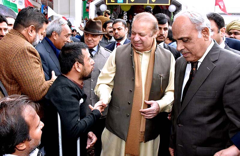 pm nawaz and cm shehbaz meet people on their arrival to inaugurate the metro bus service in multan photo inp