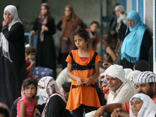 in the state of palestine women men and children find refuge in a school shelter run by the united nations relief and works agency for palestine refugees in the near east unrwa in the town of rafah in southern gaza photo unicef