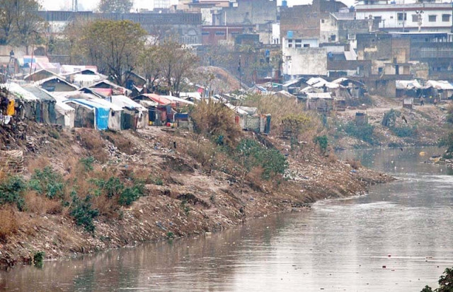 nullah leh flows along a slum in rawalpindi photo online nullah leh flows along a slum in rawalpindi photo online