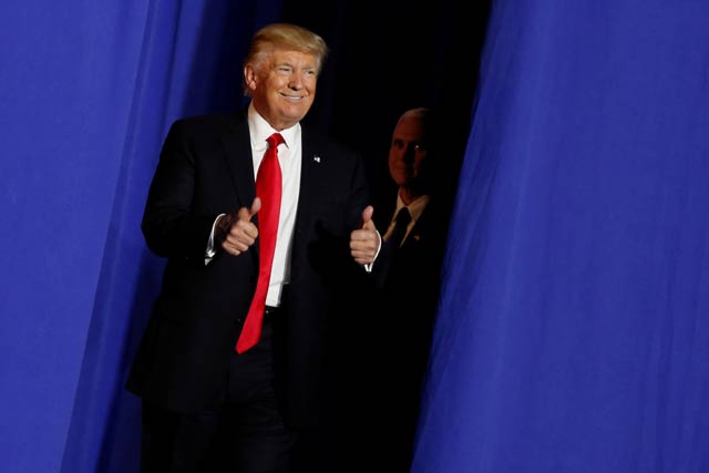 u s president donald trump l flanked by vice president mike pence takes the stage to deliver remarks at homeland security headquarters in washington us january 25 2017 photo reuters