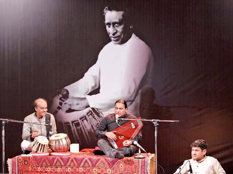artists perform at lok virsa in memory of mian shoukat hussain photo express