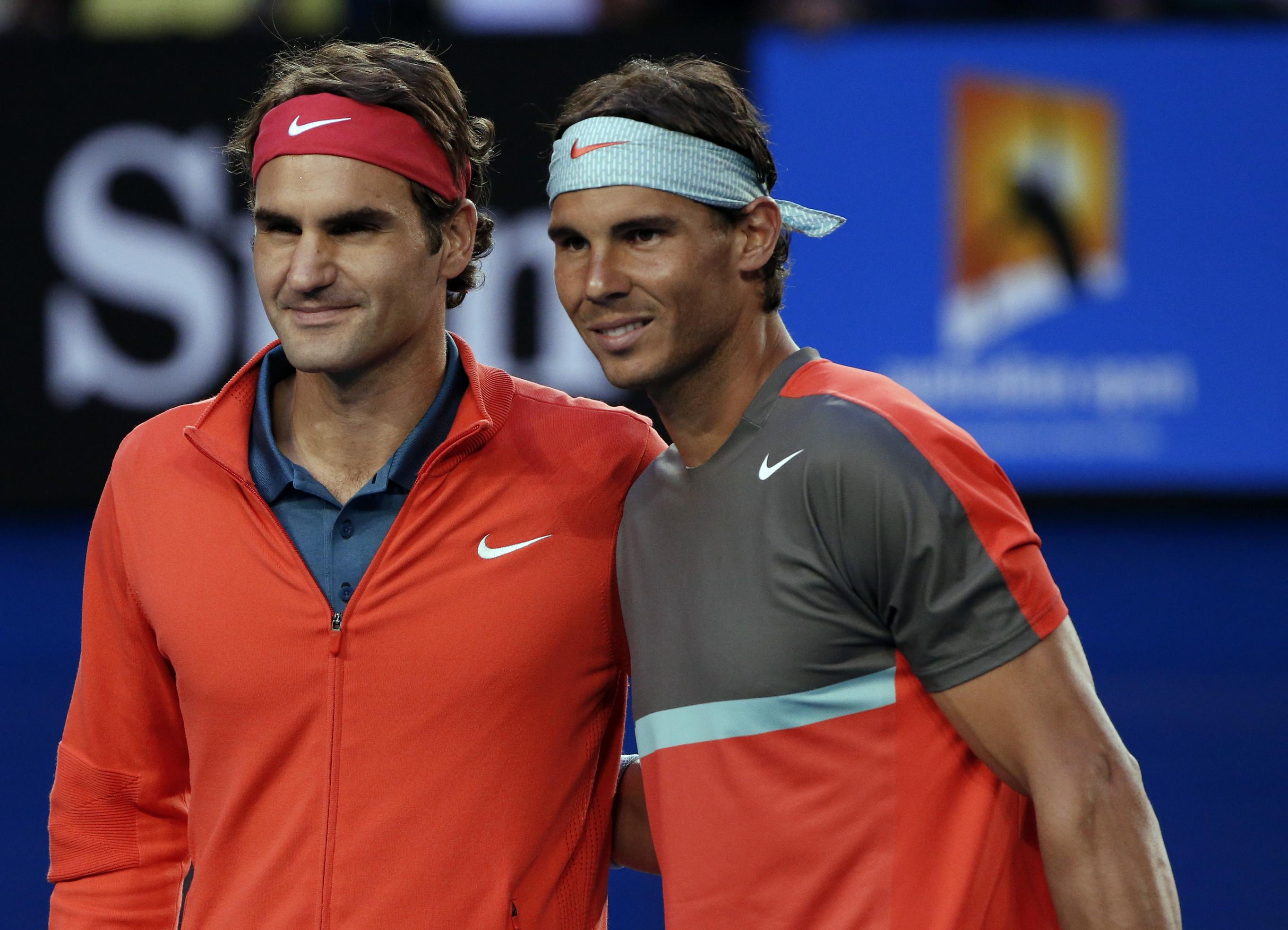 roger federer l poses for a photo with rafael nadal photo reuters